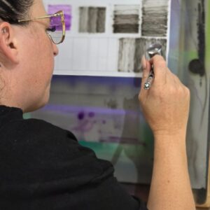 Close-up of airbrush shading practice at a beginner workshop